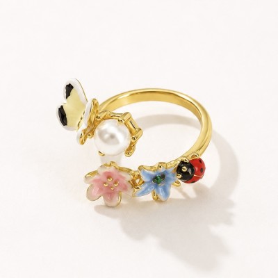 Anillo mariposa y flores esmaltadas con perla ajustable