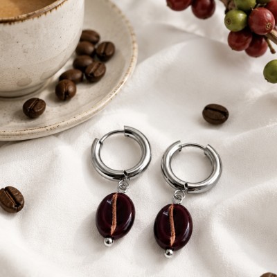 Pendientes de acero inoxidable plateados con colgante de grano de café.